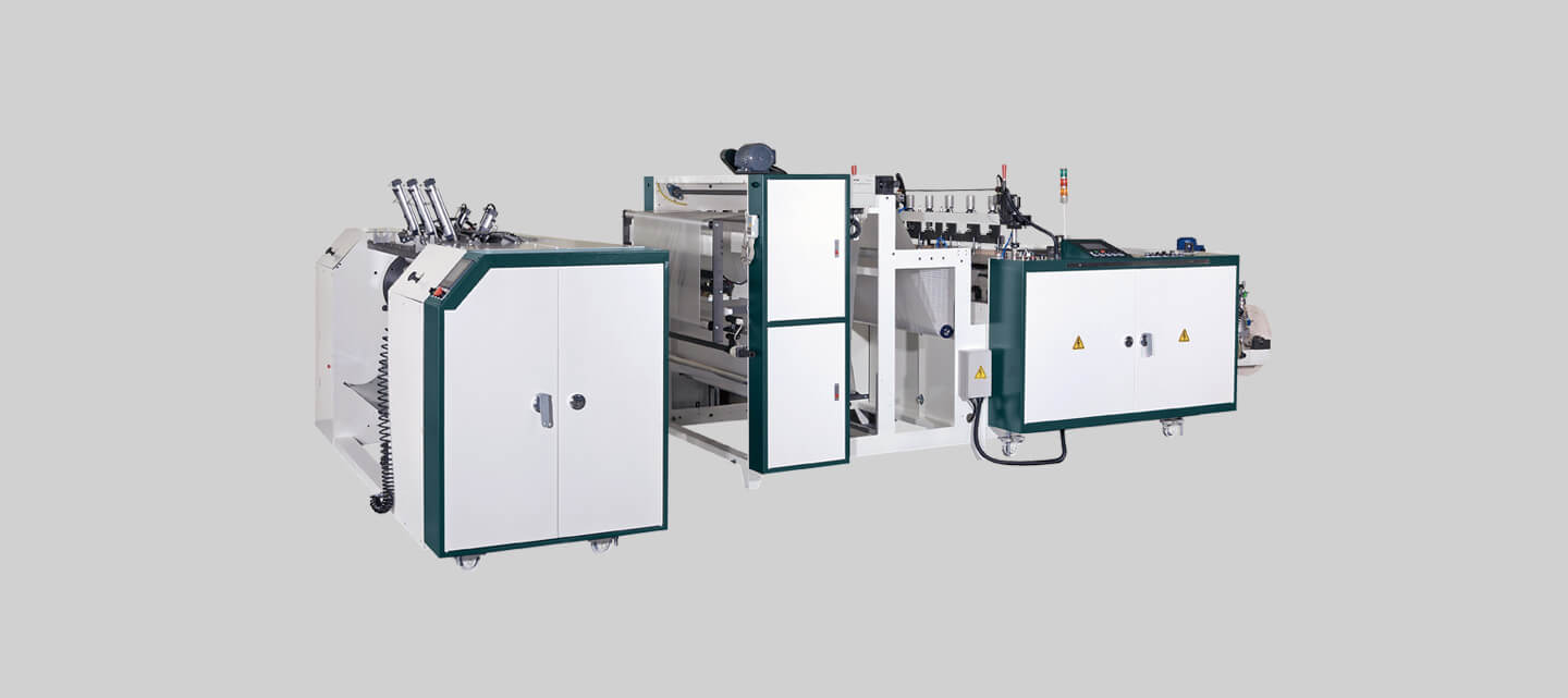Fully automatic vegetable bag on roll making machine + heat-slitting system & Multi-line core change