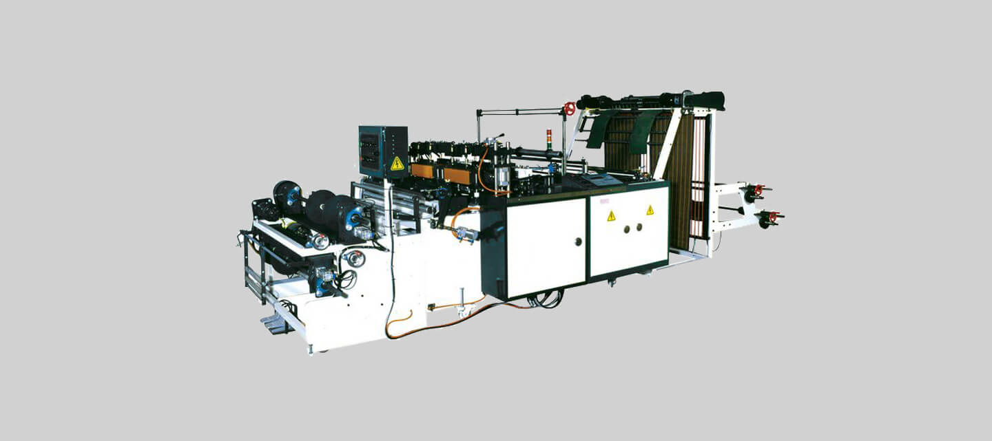 Semi-auto T-shirt bag on roll making machine (manual roll change)