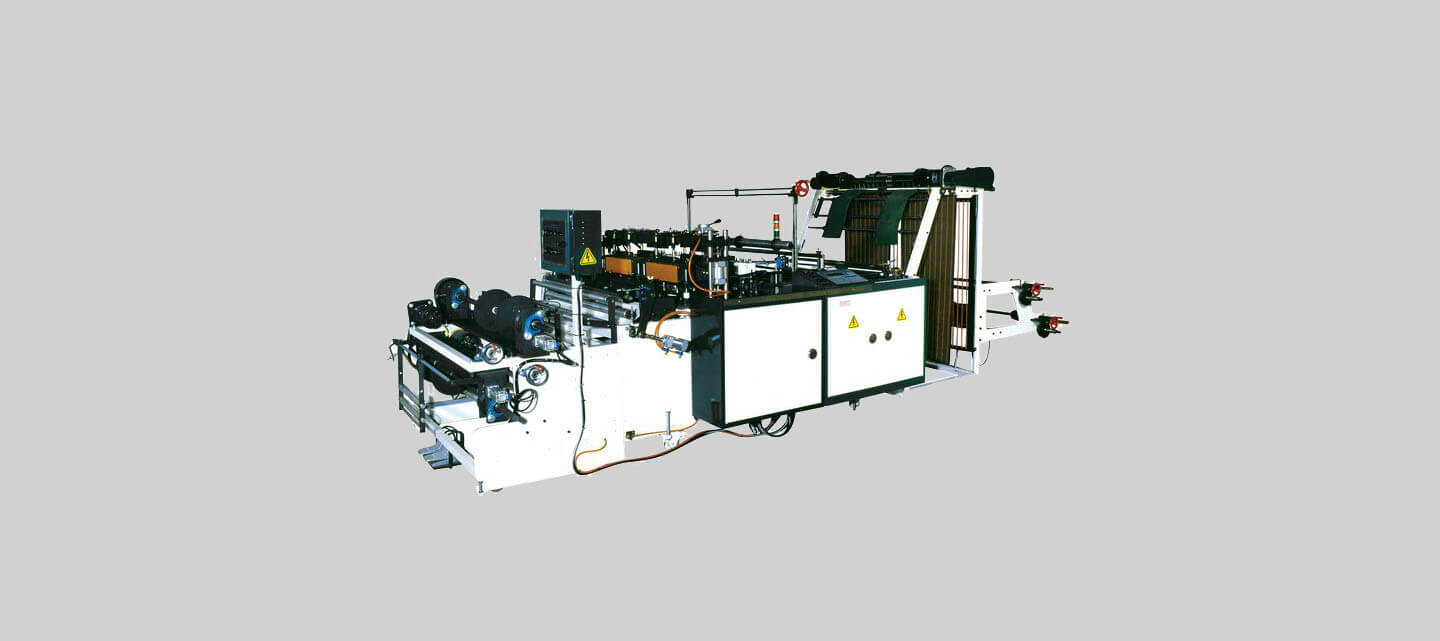 Economy T-shirt bag on roll making machine + Manual roll change system