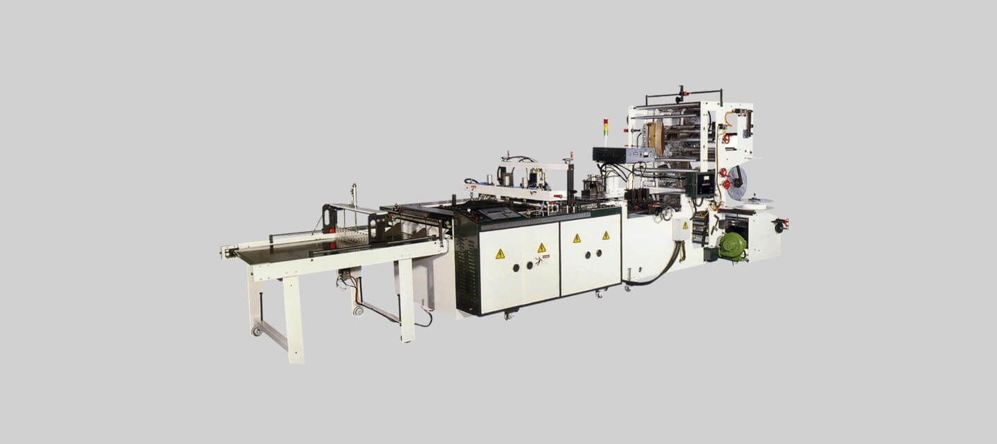 Side seal header bag making machine